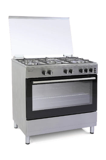 Stainless steel kitchen stove with glass door on a white background