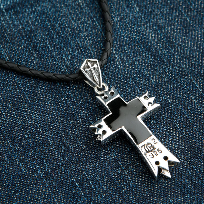 The back of the knight cross pendant, showing the .925 sterling silver hallmark.