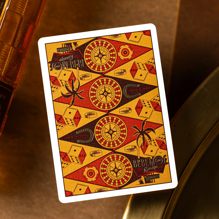 Bebemos Playing card with geometric design on a wooden surface