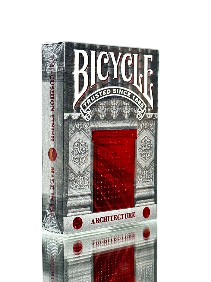 Bicycle Architecture playing card box with red and silver design on a light gray background