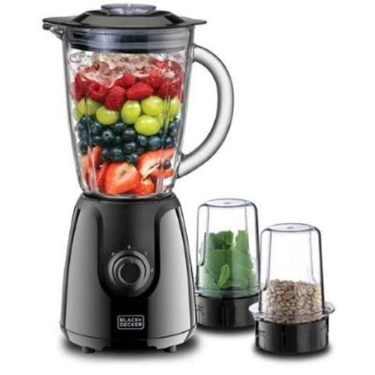 Black and Decker blender with fruits and vegetables inside on a white background