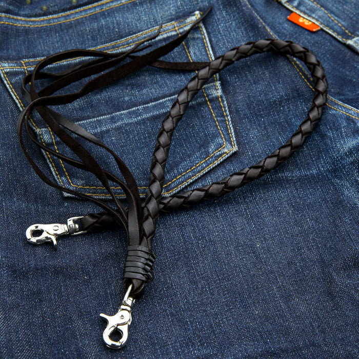 The heavy-duty silver-tone lobster clasps on the black braided leather wallet chain.