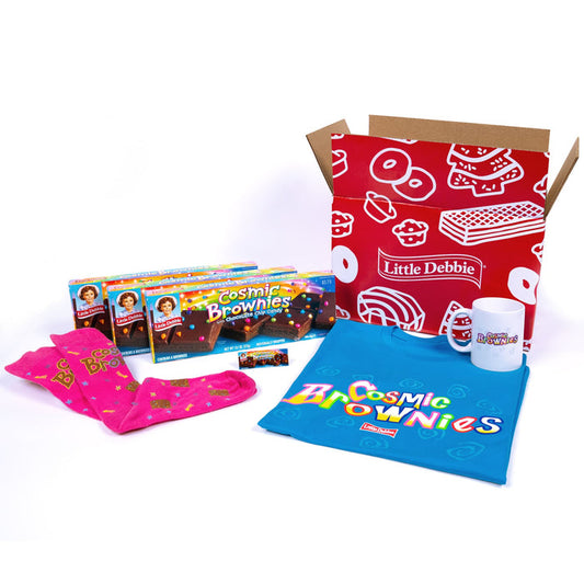 An open red and white Little Debbie box displaying three boxes of Cosmic Brownies, a blue Cosmic Brownies T-shirt, a white mug with the Cosmic Brownies logo, and a pair of pink socks with the Cosmic Brownies logo.