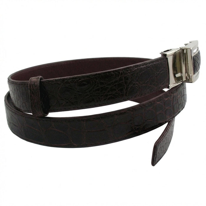 Handcrafted dark brown crocodile skin belt coiled showing natural scale pattern and tapered tip