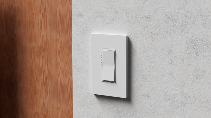White dimmer switch on a wall