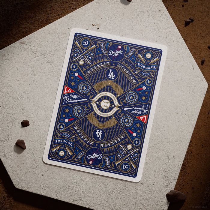 Playing card with Los Angeles Dodgers logo on a textured surface