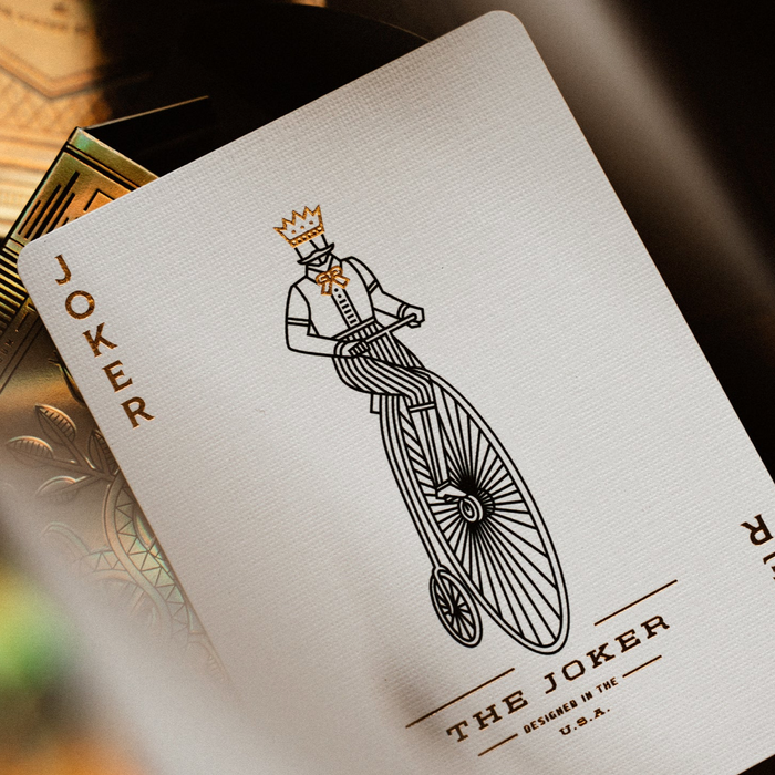 Playing card with 'Joker' design on a wooden surface