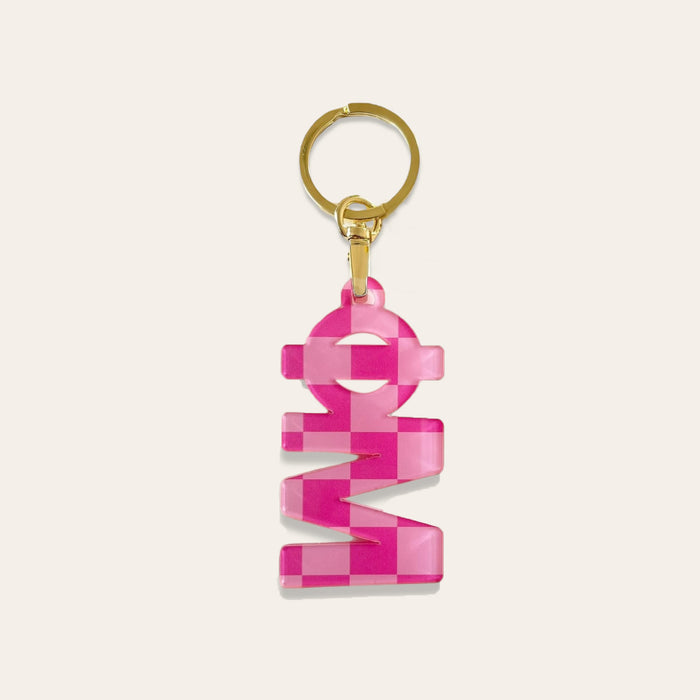 The Darling Effect’s Phi Mu Acrylic Keychain features a glossy gold keyring and a pink stacked block letter charm—perfect as a fun accessory or sorority gift.