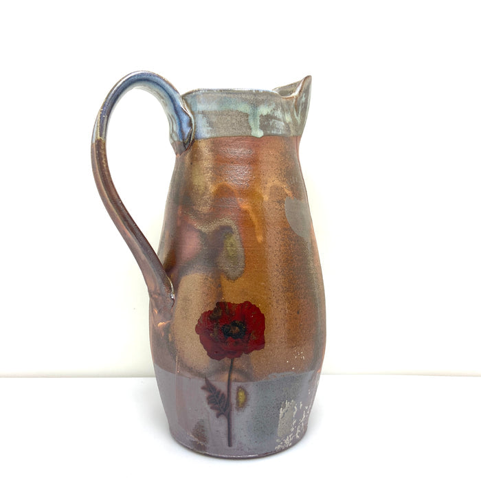 Pitcher with poppies