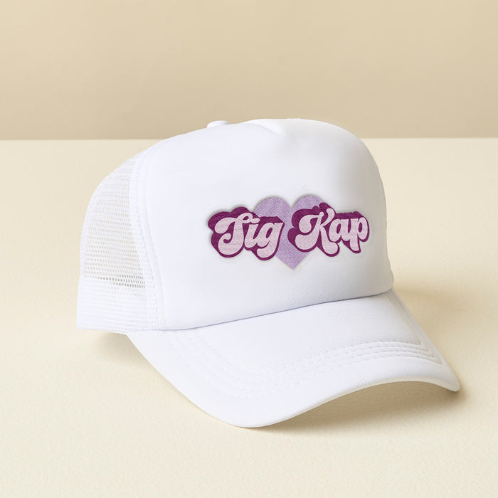 The Darling Effect's Sigma Kappa White Trucker Hat features two overlapping purple hearts and "Tig Kap" in stylized purple and white letters on a white mesh trucker design—perfect for showing off your chapter pride.