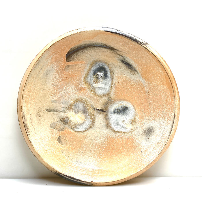 Soda fired plate