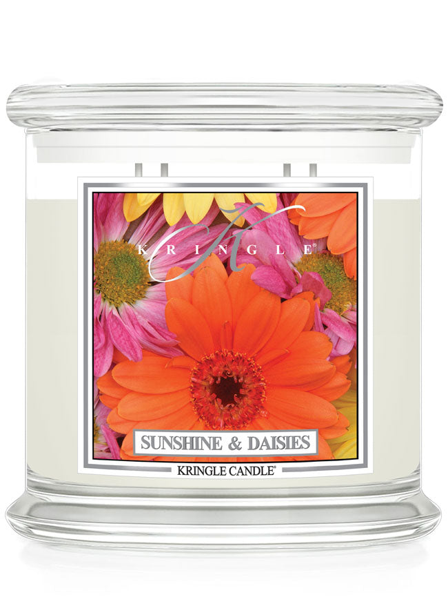 Kringle Candle with 'Sunshine & Daisies' label featuring colorful flowers on a white background