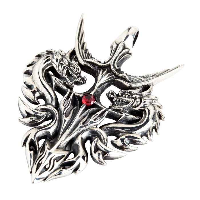 A piece of gothic fantasy jewelry, this dragon crest pendant is handcrafted from oxidized silver.