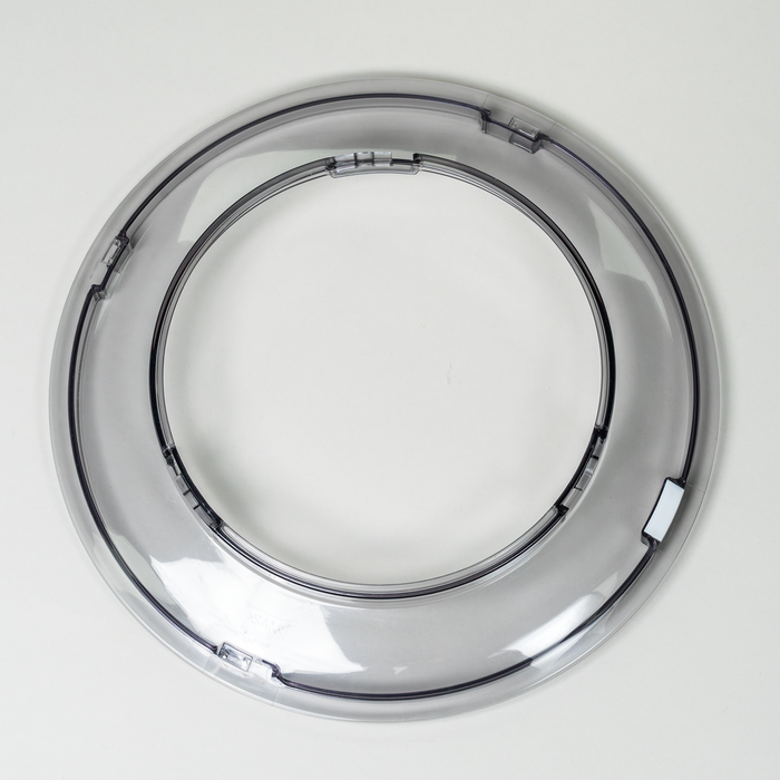 Top view of a Bosch universal plus splash ring and lid on a grey background