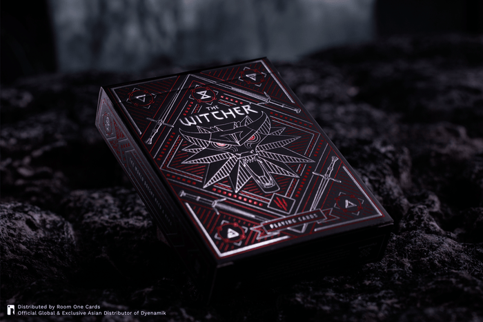 A boxed deck of cards labeled The Witcher